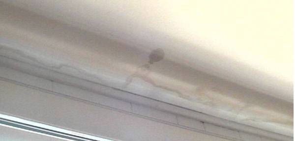 This is water damage to the ceiling over the picture window.